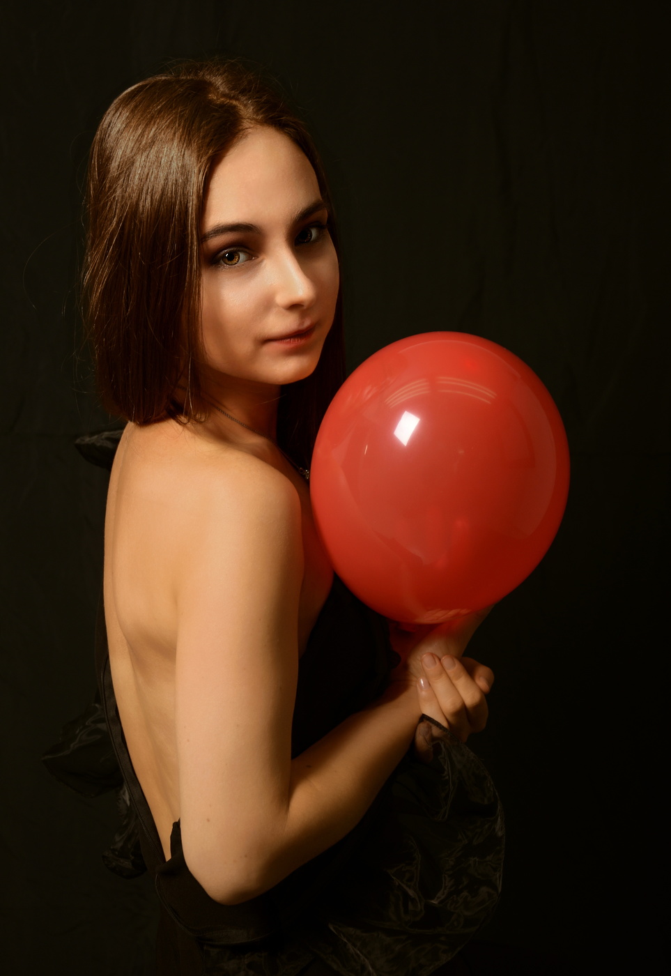Anyuta with a red balloon...