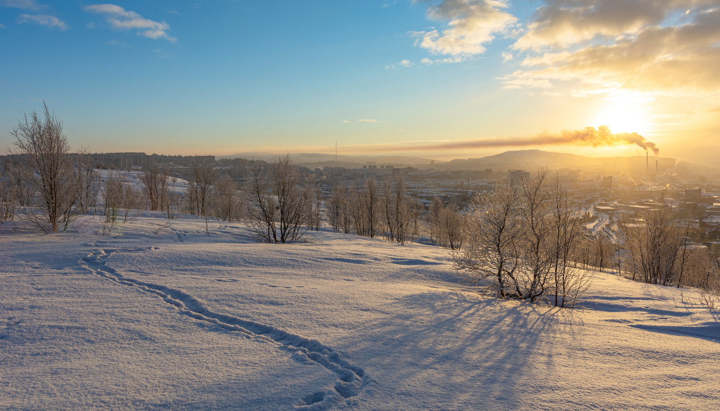 Die Sonne über der Stadt