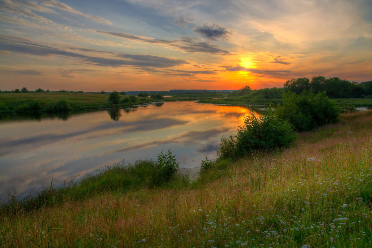 Sonnenuntergang über dem See