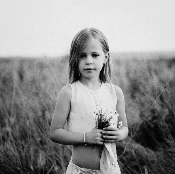 Porträt mit Gänseblümchen