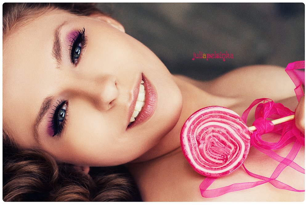 A doll with lollipop