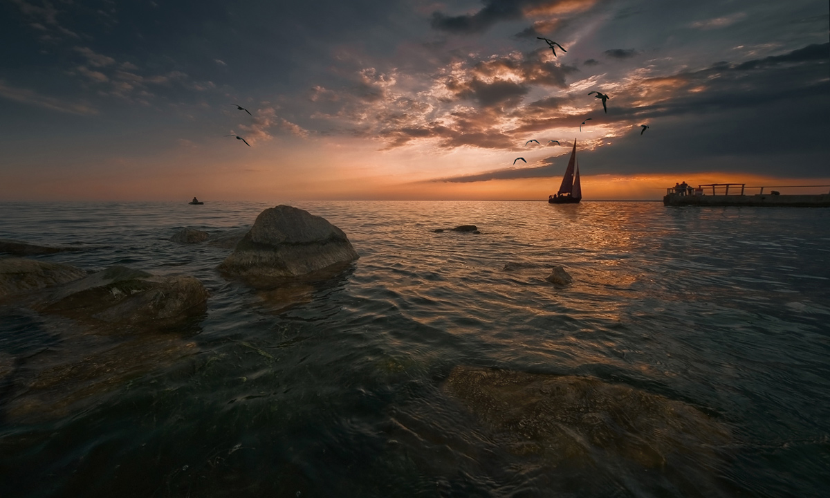 Ende nur den Sonnenuntergang und das Meer, und ein ganzes Universum um