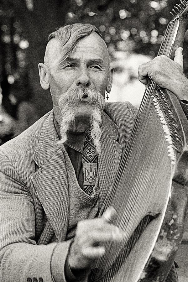 Bandore Player.