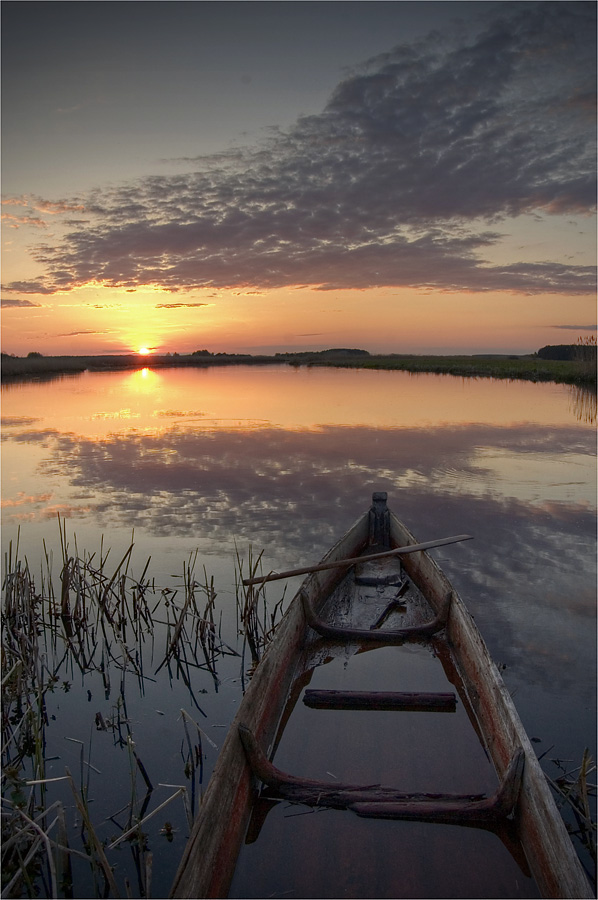 Sonnenuntergang mit Boot