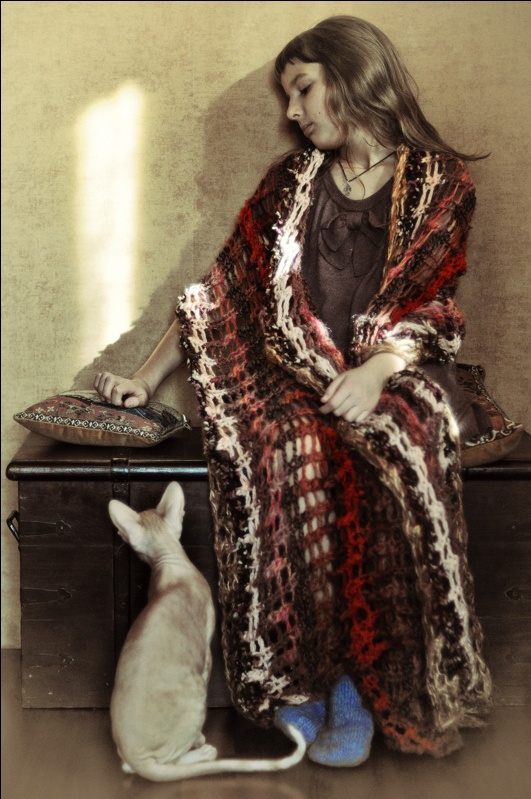 Mädchen mit einer Katze.