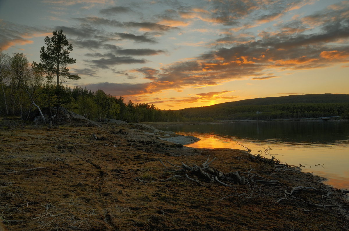 Ob der Sonnenuntergang oder Sonnenaufgang