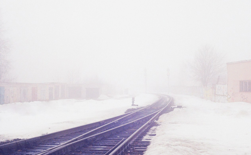 Path in winter morning mist ...
