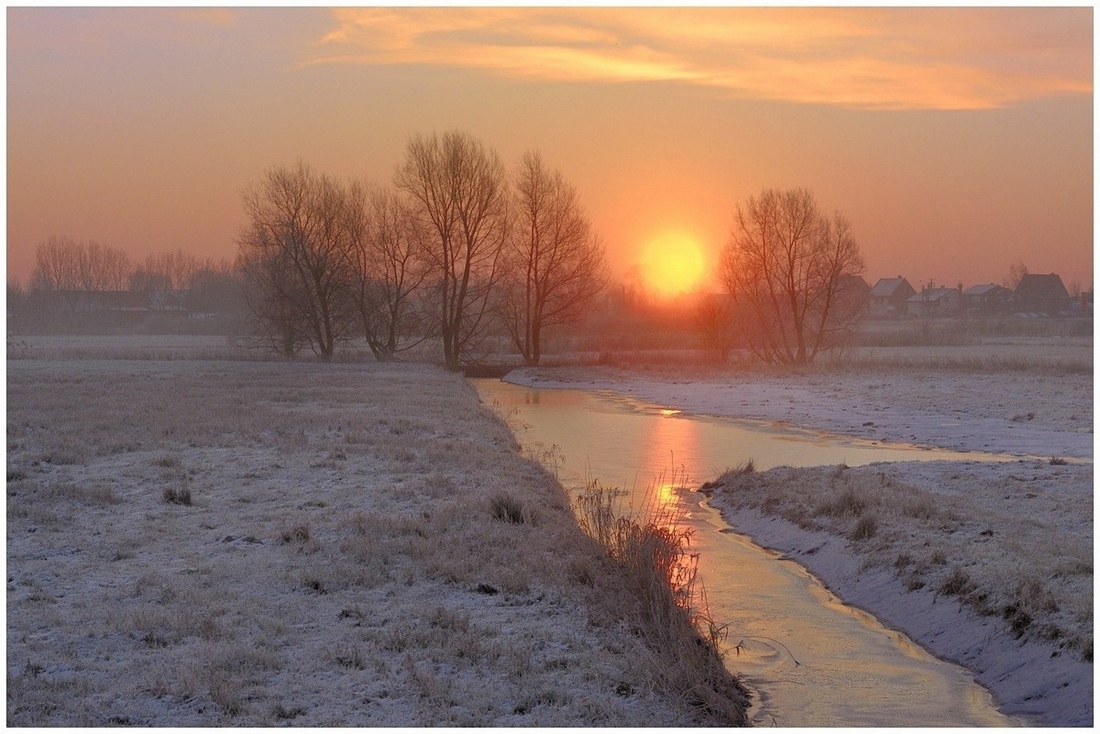 A winter sunrise in Belgium.