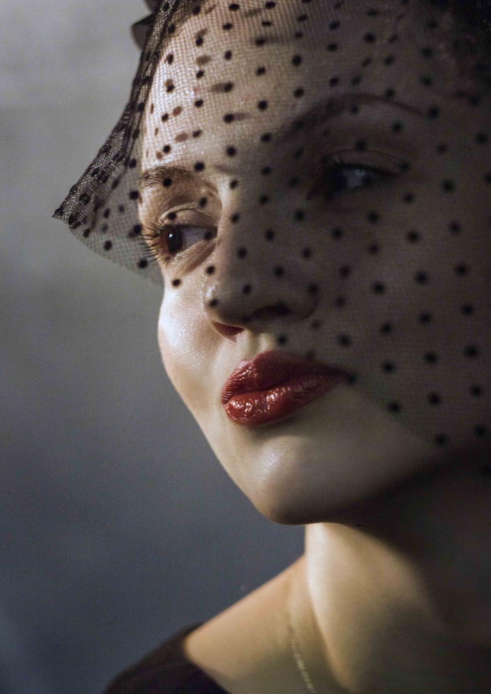 Porträt eines Mädchens mit einem Schleier