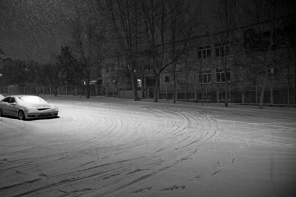 Urban Landscape mit einer Laterne und einem Schneesturm