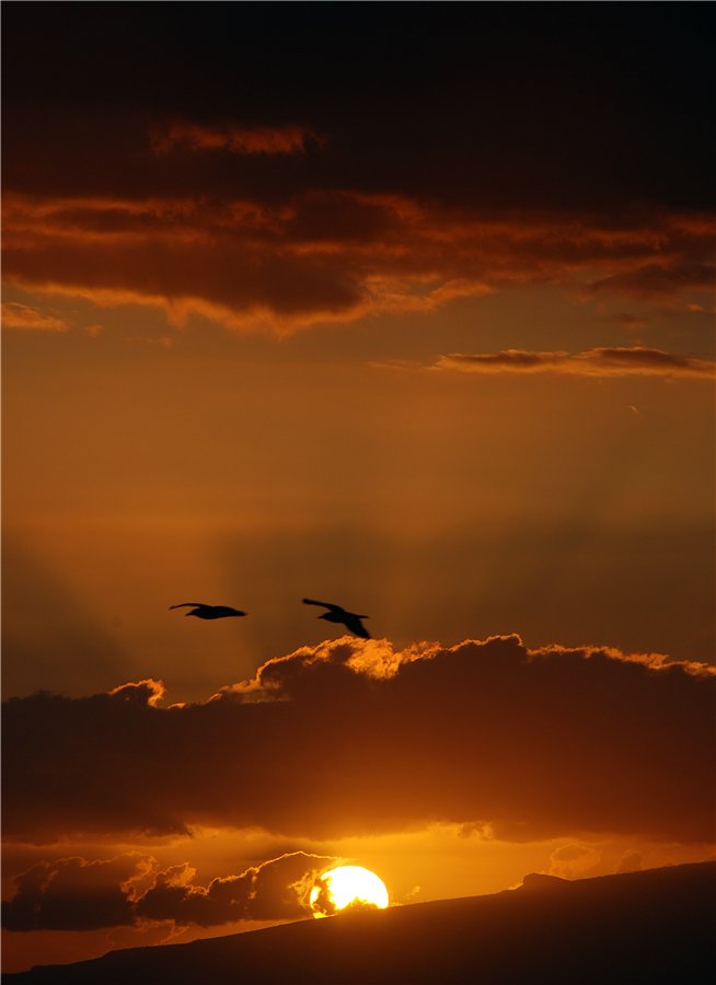 Sonnenuntergang mit zwei Unbekannten