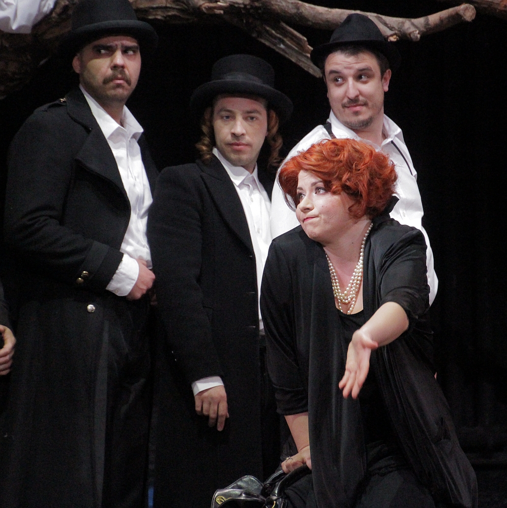 a flower and three gardeners