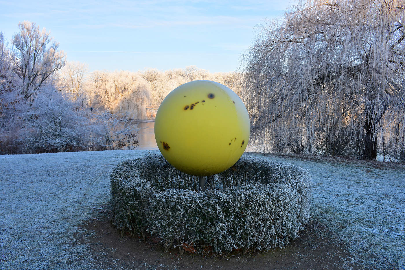 Yellow ball in winter landscape