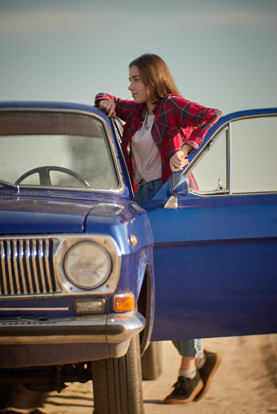 Lovely girl and old car